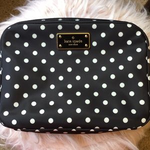 Black polka dot kate spade cross body bag.